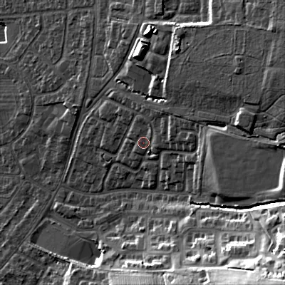 Shaded relief map of the ground around GL525LH, computed from Environment Agency LiDAR. The ground here sits at about 74 m above sea level and falls 41 m across the surrounding 800 m. Surface water reaching this point runs off ground lying to the east-north-east, 5.0 m higher.