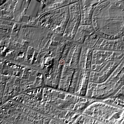 Shaded relief map of the ground around GL525NH, computed from Environment Agency LiDAR. The ground here sits at about 64 m above sea level and falls 20 m across the surrounding 800 m. Surface water reaching this point runs off ground lying to the south, 3.0 m higher.