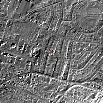 Shaded relief map of the ground around GL525NJ, computed from Environment Agency LiDAR. The ground here sits at about 64 m above sea level and falls 23 m across the surrounding 800 m. Surface water reaching this point runs off ground lying to the south, 3.2 m higher.