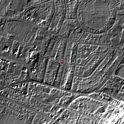 Shaded relief map of the ground around GL525NN, computed from Environment Agency LiDAR. The ground here sits at about 65 m above sea level and falls 31 m across the surrounding 800 m. Surface water reaching this point runs off ground lying to the south-east, 21.6 m higher.