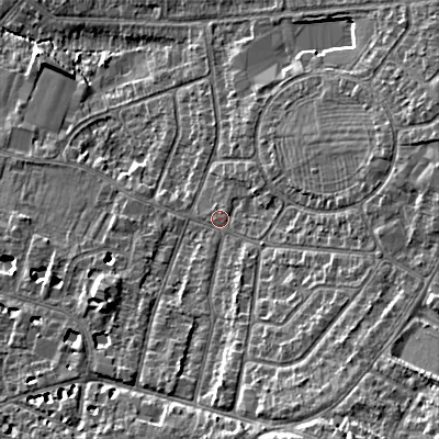 Shaded relief map of the ground around GL525NP, computed from Environment Agency LiDAR. The ground here sits at about 63 m above sea level and falls 16 m across the surrounding 800 m. Surface water reaching this point runs off ground lying to the south-south-east, 9.7 m higher.
