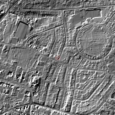 Shaded relief map of the ground around GL525NQ, computed from Environment Agency LiDAR. The ground here sits at about 63 m above sea level and falls 14 m across the surrounding 800 m. Surface water reaching this point runs off ground lying to the east, 5.9 m higher.