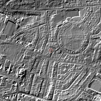 Shaded relief map of the ground around GL525NR, computed from Environment Agency LiDAR. The ground here sits at about 63 m above sea level and falls 16 m across the surrounding 800 m. Surface water reaching this point runs off ground lying to the east, 1.7 m higher.