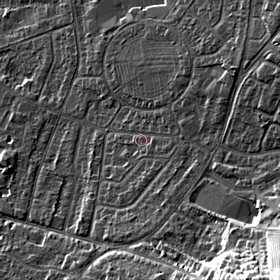 Shaded relief map of the ground around GL525NX, computed from Environment Agency LiDAR. The ground here sits at about 66 m above sea level and falls 33 m across the surrounding 800 m. Surface water reaching this point runs off ground lying to the south-east, 26.3 m higher.