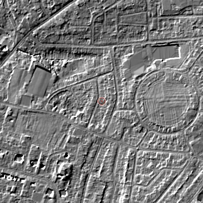 Shaded relief map of the ground around GL525PU, computed from Environment Agency LiDAR. The ground here sits at about 62 m above sea level and falls 13 m across the surrounding 800 m. Surface water reaching this point runs off ground lying to the east-north-east, 1.5 m higher.