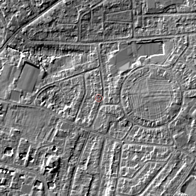 Shaded relief map of the ground around GL525PZ, computed from Environment Agency LiDAR. The ground here sits at about 63 m above sea level and falls 13 m across the surrounding 800 m. Surface water reaching this point runs off ground lying to the east, 6.6 m higher.