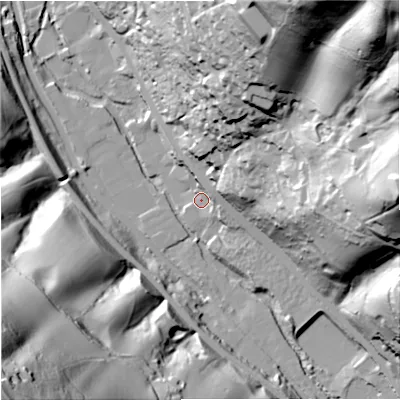 Shaded relief map of the ground around GL52BU, computed from Environment Agency LiDAR. The ground here sits at about 54 m above sea level and falls 112 m across the surrounding 800 m. Surface water reaching this point runs off ground lying to the east-north-east, 7.4 m higher.