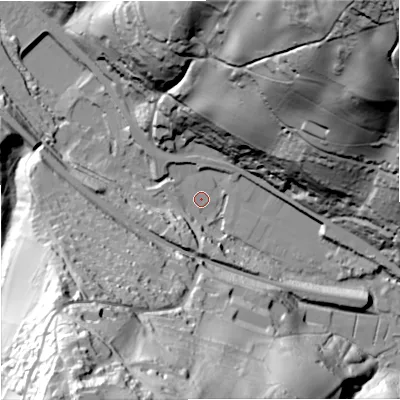 Shaded relief map of the ground around GL52QQ, computed from Environment Agency LiDAR. The ground here sits at about 57 m above sea level and falls 117 m across the surrounding 800 m. Surface water reaching this point runs off ground lying to the north-east, 112.8 m higher.
