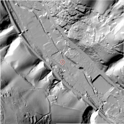Shaded relief map of the ground around GL52SQ, computed from Environment Agency LiDAR. The ground here sits at about 53 m above sea level and falls 117 m across the surrounding 800 m. Surface water reaching this point runs off ground lying to the south-west, 112.0 m higher.