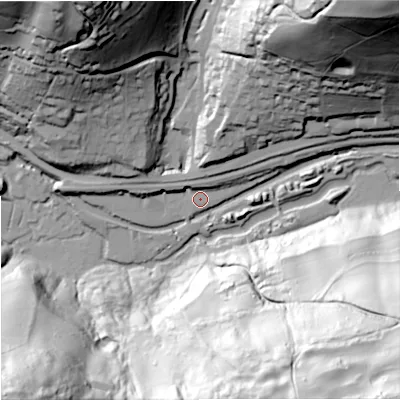 Shaded relief map of the ground around GL52TG, computed from Environment Agency LiDAR. The ground here sits at about 62 m above sea level and falls 120 m across the surrounding 800 m. Surface water reaching this point runs off ground lying to the north-north-west, 5.2 m higher.