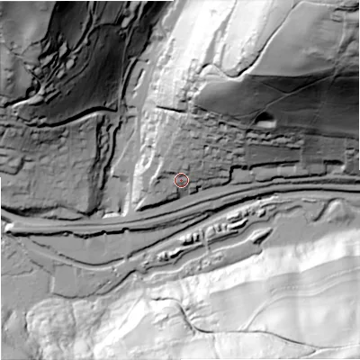 Shaded relief map of the ground around GL52TL, computed from Environment Agency LiDAR. The ground here sits at about 74 m above sea level and falls 122 m across the surrounding 800 m. Surface water reaching this point runs off ground lying to the north-north-east, 55.0 m higher.