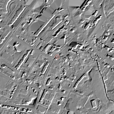 Shaded relief map of the ground around GL537HJ, computed from Environment Agency LiDAR. The ground here sits at about 59 m above sea level and falls 15 m across the surrounding 800 m. Surface water reaching this point runs off ground lying to the south, 7.4 m higher.