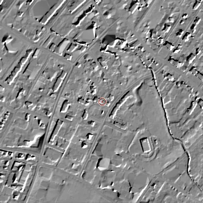 Shaded relief map of the ground around GL537JJ, computed from Environment Agency LiDAR. The ground here sits at about 60 m above sea level and falls 17 m across the surrounding 800 m. Surface water reaching this point runs off ground lying to the south, 2.6 m higher.