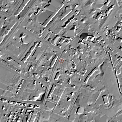 Shaded relief map of the ground around GL537JT, computed from Environment Agency LiDAR. The ground here sits at about 60 m above sea level and falls 16 m across the surrounding 800 m. Surface water reaching this point runs off ground lying to the south-south-west, 10.7 m higher.