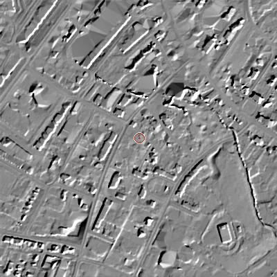 Shaded relief map of the ground around GL537JU, computed from Environment Agency LiDAR. The ground here sits at about 59 m above sea level and falls 16 m across the surrounding 800 m. Surface water reaching this point runs off ground lying to the south, 6.1 m higher.