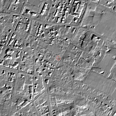 Shaded relief map of the ground around GL537LX, computed from Environment Agency LiDAR. The ground here sits at about 70 m above sea level and falls 15 m across the surrounding 800 m. Surface water reaching this point runs off ground lying to the south-south-east, 9.1 m higher.