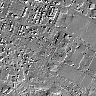 Shaded relief map of the ground around GL537NN, computed from Environment Agency LiDAR. The ground here sits at about 70 m above sea level and falls 14 m across the surrounding 800 m. Surface water reaching this point runs off ground lying to the east, 5.1 m higher.