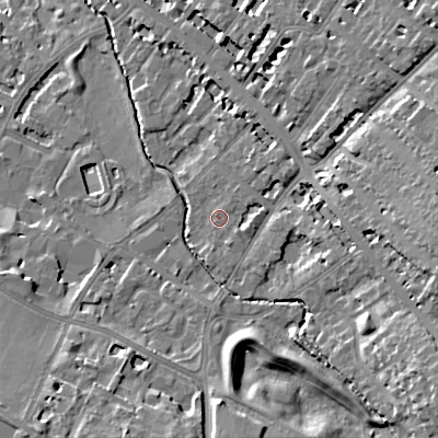 Shaded relief map of the ground around GL537SF, computed from Environment Agency LiDAR. The ground here sits at about 64 m above sea level and falls 18 m across the surrounding 800 m. Surface water reaching this point runs off ground lying to the east, 1.8 m higher.