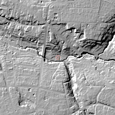 Shaded relief map of the ground around GL538BL, computed from Environment Agency LiDAR. The ground here sits at about 74 m above sea level and falls 26 m across the surrounding 800 m. Surface water reaching this point runs off ground lying to the north-north-west, 13.5 m higher.
