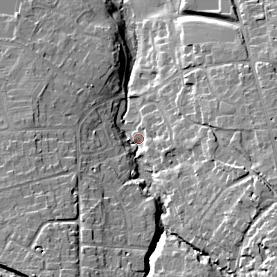 Shaded relief map of the ground around GL539BG, computed from Environment Agency LiDAR. The ground here sits at about 77 m above sea level and falls 23 m across the surrounding 800 m. Surface water reaching this point runs off ground lying to the south-east, 19.5 m higher.