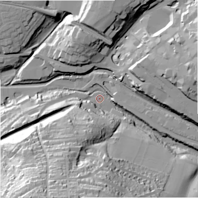 Shaded relief map of the ground around GL53JU, computed from Environment Agency LiDAR. The ground here sits at about 39 m above sea level and falls 64 m across the surrounding 800 m. Surface water reaching this point runs off ground lying to the south-south-west, 60.9 m higher.