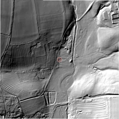 Shaded relief map of the ground around GL541LE, computed from Environment Agency LiDAR. The ground here sits at about 148 m above sea level and falls 39 m across the surrounding 800 m. Surface water reaching this point runs off ground lying to the north-west, 36.5 m higher.