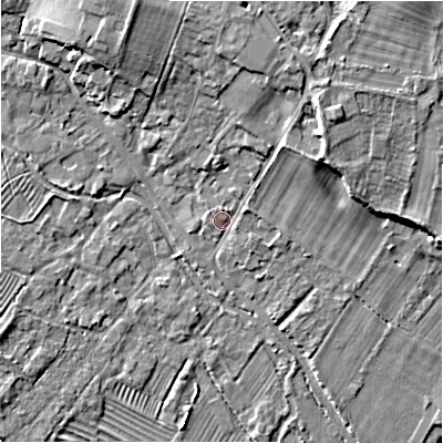 Shaded relief map of the ground around GL542AA, computed from Environment Agency LiDAR. The ground here sits at about 130 m above sea level and falls 10 m across the surrounding 800 m. Surface water reaching this point runs off ground lying to the north, 6.7 m higher.