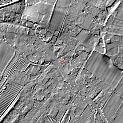 Shaded relief map of the ground around GL542AN, computed from Environment Agency LiDAR. The ground here sits at about 129 m above sea level and falls 9 m across the surrounding 800 m. Surface water reaching this point runs off ground lying to the north, 7.3 m higher.