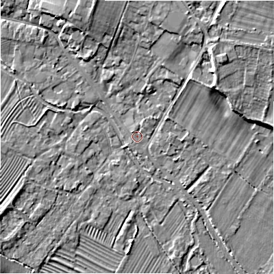 Shaded relief map of the ground around GL542AQ, computed from Environment Agency LiDAR. The ground here sits at about 129 m above sea level and falls 9 m across the surrounding 800 m. Surface water reaching this point runs off ground lying to the north, 7.3 m higher.