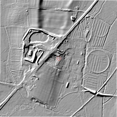 Shaded relief map of the ground around GL542EY, computed from Environment Agency LiDAR. The ground here sits at about 136 m above sea level and falls 11 m across the surrounding 800 m. Surface water reaching this point runs off ground lying to the north-west, 4.4 m higher.