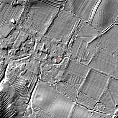 Shaded relief map of the ground around GL542HP, computed from Environment Agency LiDAR. The ground here sits at about 137 m above sea level and falls 18 m across the surrounding 800 m. Surface water reaching this point runs off ground lying to the west-north-west, 2.5 m higher.