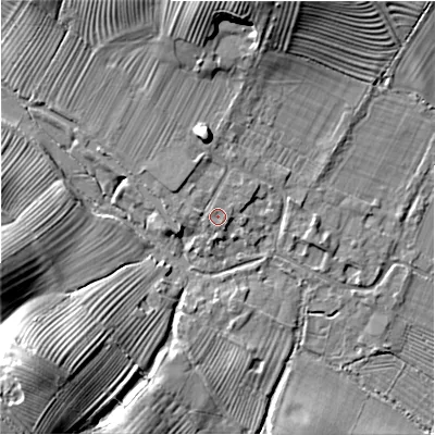 Shaded relief map of the ground around GL542HX, computed from Environment Agency LiDAR. The ground here sits at about 138 m above sea level and falls 33 m across the surrounding 800 m. Surface water reaching this point runs off ground lying to the north, 9.9 m higher.