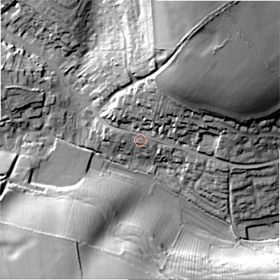 Shaded relief map of the ground around GL543EU, computed from Environment Agency LiDAR. The ground here sits at about 166 m above sea level and falls 39 m across the surrounding 800 m. Surface water reaching this point runs off ground lying to the north-north-east, 9.1 m higher.