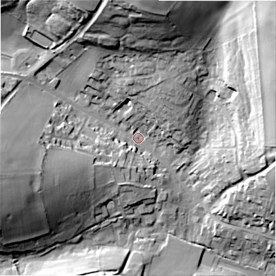 Shaded relief map of the ground around GL543EZ, computed from Environment Agency LiDAR. The ground here sits at about 162 m above sea level and falls 35 m across the surrounding 800 m. Surface water reaching this point runs off ground lying to the north, 32.7 m higher.