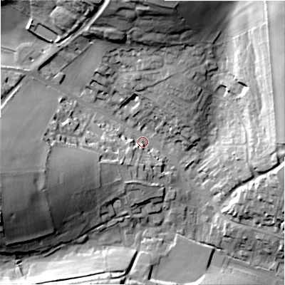 Shaded relief map of the ground around GL543HG, computed from Environment Agency LiDAR. The ground here sits at about 163 m above sea level and falls 35 m across the surrounding 800 m. Surface water reaching this point runs off ground lying to the north, 31.7 m higher.