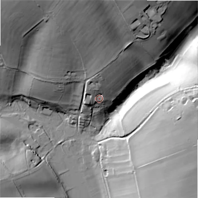 Shaded relief map of the ground around GL543JU, computed from Environment Agency LiDAR. The ground here sits at about 130 m above sea level and falls 45 m across the surrounding 800 m. Surface water reaching this point runs off ground lying to the north, 11.8 m higher.