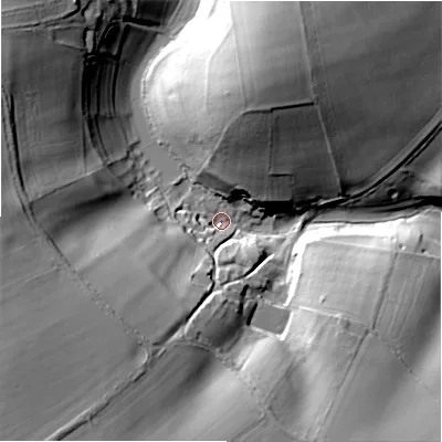 Shaded relief map of the ground around GL543PN, computed from Environment Agency LiDAR. The ground here sits at about 145 m above sea level and falls 39 m across the surrounding 800 m. Surface water reaching this point runs off ground lying to the west-south-west, 33.8 m higher.