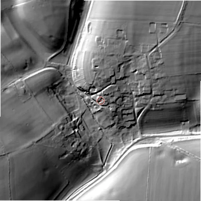 Shaded relief map of the ground around GL543QZ, computed from Environment Agency LiDAR. The ground here sits at about 127 m above sea level and falls 29 m across the surrounding 800 m. Surface water reaching this point runs off ground lying to the north-north-east, 6.7 m higher.