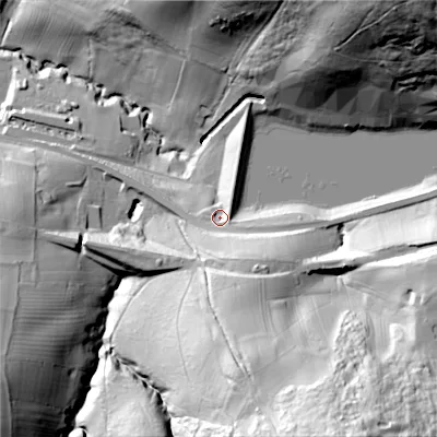 Shaded relief map of the ground around GL544HG, computed from Environment Agency LiDAR. The ground here sits at about 116 m above sea level and falls 87 m across the surrounding 800 m. Surface water reaching this point runs off ground lying to the south-south-east, 26.9 m higher.