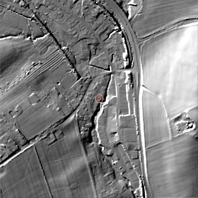 Shaded relief map of the ground around GL544HL, computed from Environment Agency LiDAR. The ground here sits at about 164 m above sea level and falls 33 m across the surrounding 800 m. Surface water reaching this point runs off ground lying to the east, 32.4 m higher.
