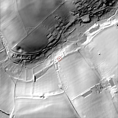 Shaded relief map of the ground around GL544HX, computed from Environment Agency LiDAR. The ground here sits at about 175 m above sea level and falls 47 m across the surrounding 800 m. Surface water reaching this point runs off ground lying to the south-east, 12.9 m higher.