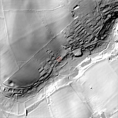 Shaded relief map of the ground around GL544JD, computed from Environment Agency LiDAR. The ground here sits at about 174 m above sea level and falls 41 m across the surrounding 800 m. Surface water reaching this point runs off ground lying to the north-north-east, 19.4 m higher.
