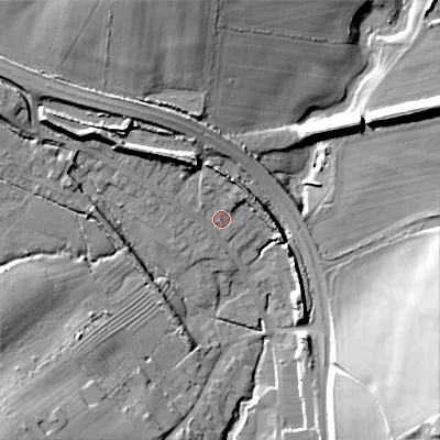 Shaded relief map of the ground around GL544LA, computed from Environment Agency LiDAR. The ground here sits at about 167 m above sea level and falls 31 m across the surrounding 800 m. Surface water reaching this point runs off ground lying to the north, 4.9 m higher.