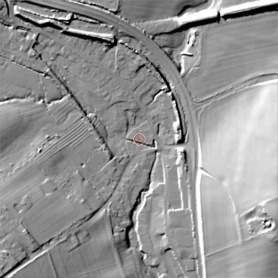 Shaded relief map of the ground around GL544LG, computed from Environment Agency LiDAR. The ground here sits at about 164 m above sea level and falls 33 m across the surrounding 800 m. Surface water reaching this point runs off ground lying to the south-west, 22.3 m higher.