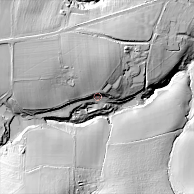 Shaded relief map of the ground around GL545AH, computed from Environment Agency LiDAR. The ground here sits at about 123 m above sea level and falls 51 m across the surrounding 800 m. Surface water reaching this point runs off ground lying to the north-north-west, 16.4 m higher.