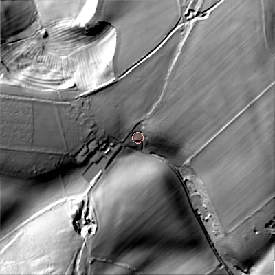 Shaded relief map of the ground around GL545AT, computed from Environment Agency LiDAR. The ground here sits at about 227 m above sea level and falls 66 m across the surrounding 800 m. Surface water reaching this point runs off ground lying to the north-east, 42.6 m higher.