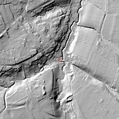Shaded relief map of the ground around GL545JA, computed from Environment Agency LiDAR. The ground here sits at about 82 m above sea level and falls 26 m across the surrounding 800 m. Surface water reaching this point runs off ground lying to the south-east, 23.1 m higher.