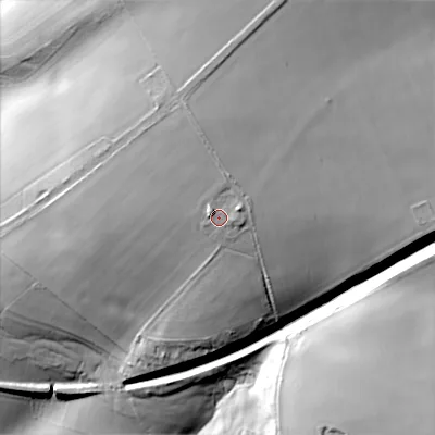 Shaded relief map of the ground around GL545RH, computed from Environment Agency LiDAR. The ground here sits at about 254 m above sea level and falls 53 m across the surrounding 800 m. Surface water reaching this point runs off ground lying to the east-north-east, 3.5 m higher.