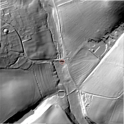 Shaded relief map of the ground around GL545UA, computed from Environment Agency LiDAR. The ground here sits at about 160 m above sea level and falls 55 m across the surrounding 800 m. Surface water reaching this point runs off ground lying to the north-east, 51.4 m higher.