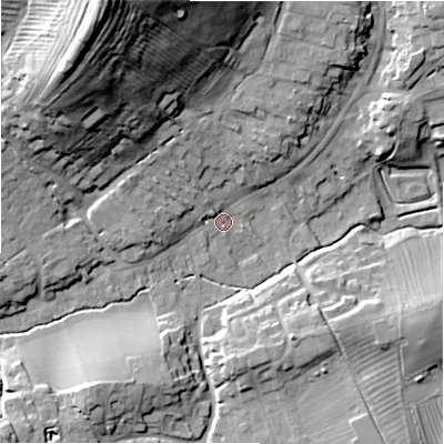 Shaded relief map of the ground around GL556AT, computed from Environment Agency LiDAR. The ground here sits at about 140 m above sea level and falls 49 m across the surrounding 800 m. Surface water reaching this point runs off ground lying to the north-west, 3.9 m higher.